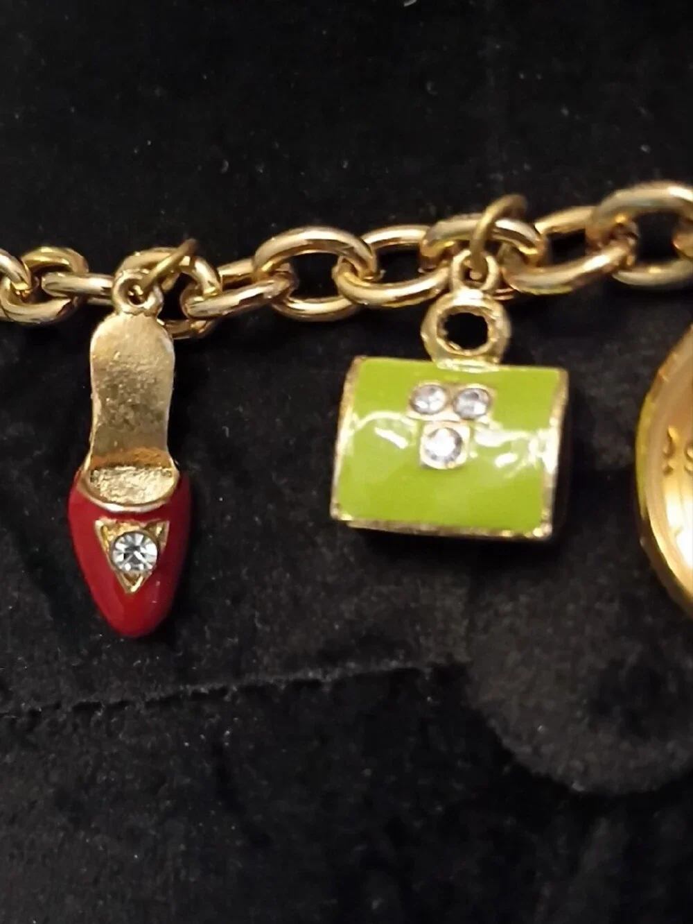 Gossip Gold-Tone Charm Bracelet Watch with Green and Red Accents